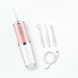 Contenido de la caja: irrigador Oravia rosa, 4 boquillas (una puesta) y cable USB